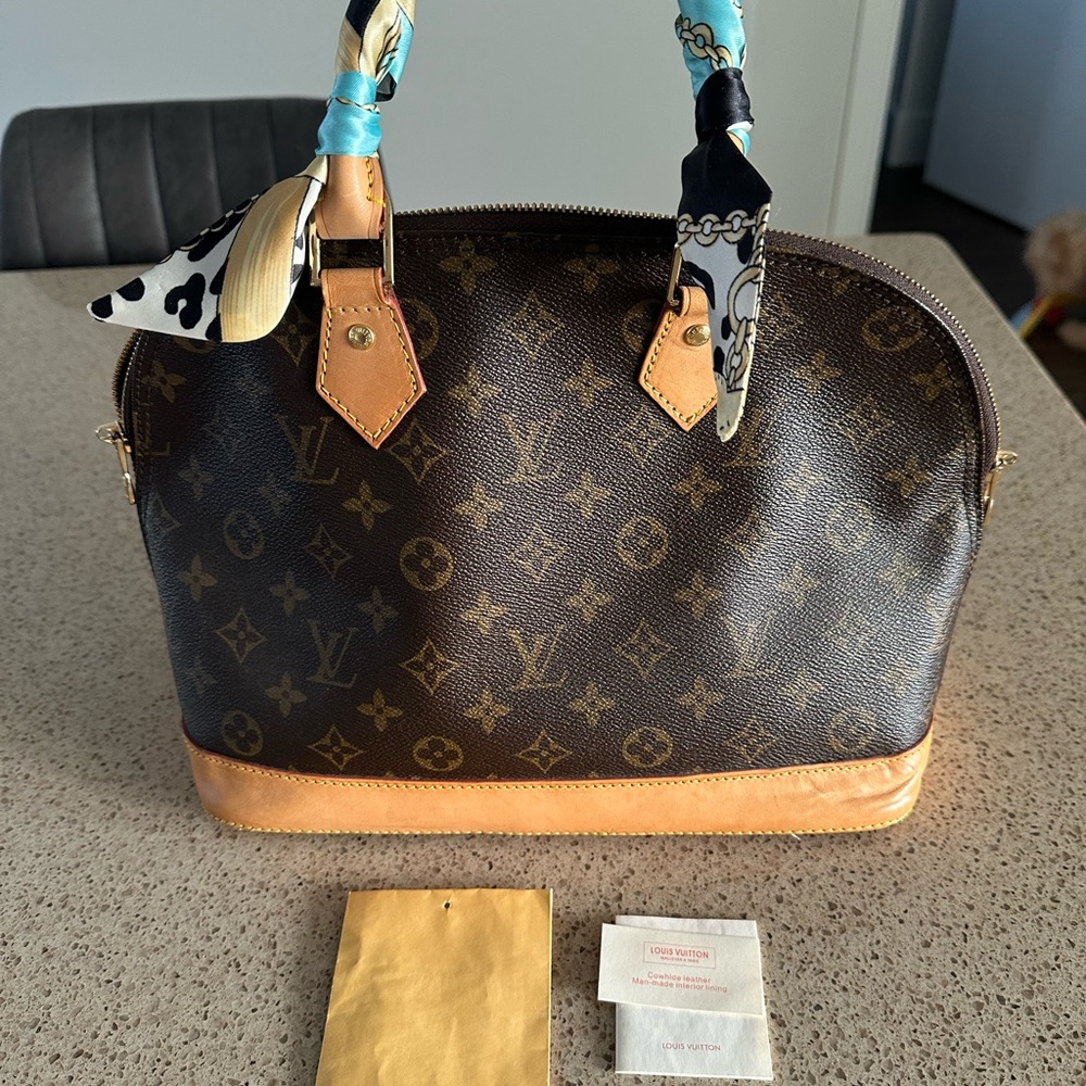 Louis Vuitton Brown Monogram Handbag